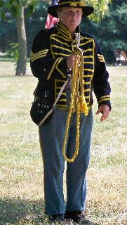 Bugler prepares to play Taps for friend